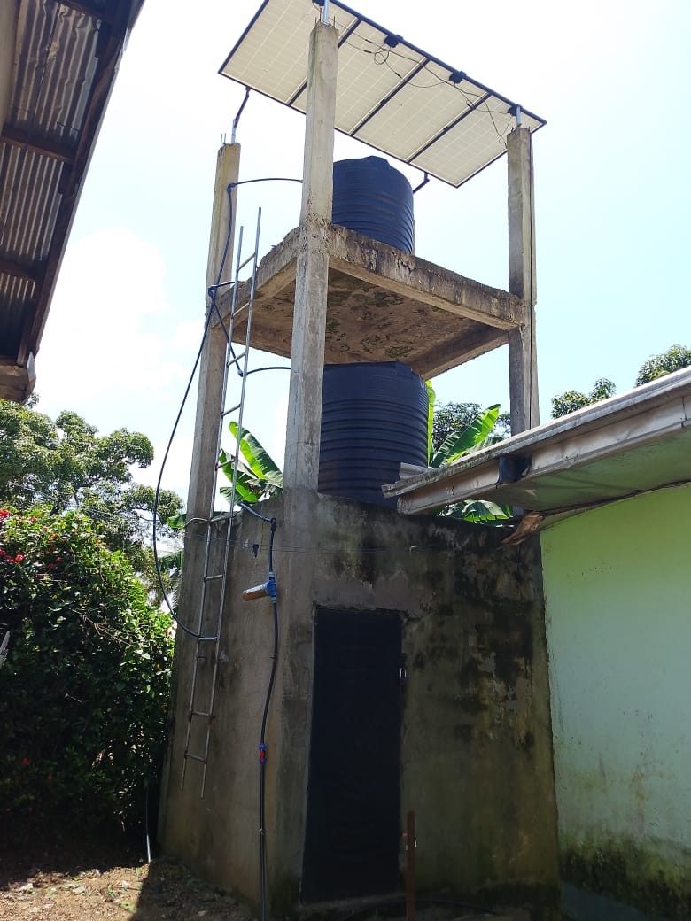 The completed solar-powered water tower at Rainbow Orphanage